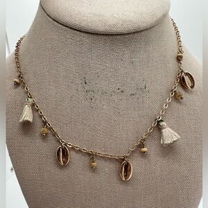 ALDO gold tone tassel and shell charm necklace